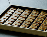 Shogi pieces craftsman "Fu-getsu 富月" made Mikurajima-hon-tsuge (Mikura Island grown boxwood), Tora-Moku (Tiger-striped wood grain), Minase-syo (Minase script), Mori-age(embossed) Shogi pieces SHK-FG510-01
