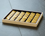 Shogi pieces craftsman "Fu-getsu 富月" made Satsuma-hon-tsuge (Satsuma boxwood) Kujaku-moku (Peacock pattern wood grain), Minase-syo (Minase script) Mori-age(embossed) Shogi pieces SHK-FG510-02