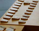 Shogi pieces craftsman "Fu-getsu 富月" made Satsuma-hon-tsuge (Satsuma boxwood) Kujaku-moku (Peacock pattern wood grain), Minase-syo (Minase script) Mori-age(embossed) Shogi pieces SHK-FG510-02