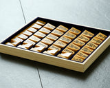 Shogi pieces craftsman "Fu-getsu 富月" made Satsuma-hon-tsuge (Satsuma boxwood) Inazuma-moku (lightning pattern wood grain), Ryoko-syo (Ryoko-syo script), Mori-age(embossed) Shogi pieces SHK-FG510-05