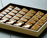 Shogi pieces craftsman "Fu-getsu 富月" made Satsuma-hon-tsuge (Satsuma boxwood) Inazuma-moku (lightning pattern wood grain), Ryoko-syo (Ryoko-syo script), Mori-age(embossed) Shogi pieces SHK-FG510-05