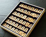 Shogi pieces craftsman "Sou-getsu 宗月" made Mikurajima-hon-tsuge (Mikura Island grown boxwood), Aka-masa (strong reddish color and straight wood grain), Kiyoyasu-sho (Kiyo-yasu script), Mori-age(embossed) Shogi pieces SHK-SG510-03