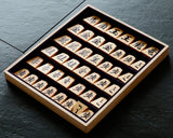 Shogi pieces craftsman "Sou-getsu 宗月" made Mikurajima-hon-tsuge (Mikura Island grown boxwood), Aka-masa (strong reddish color and straight wood grain), Ichiji-bori (Ichiji-bori script), Mori-age(embossed) Shogi pieces SHK-SG510-04