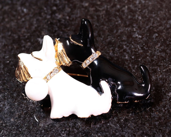 Brooch (two dogs in black and white)