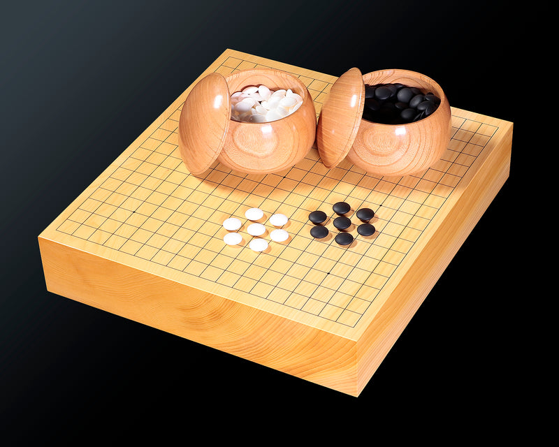 - Miniature 3-piece Go set 208-01 -   
Our Special Selection a set of 15 mm diameter Clamshell Go stones, miniature Go board No.76808 and Go bowls, 3-piece small-scale set.